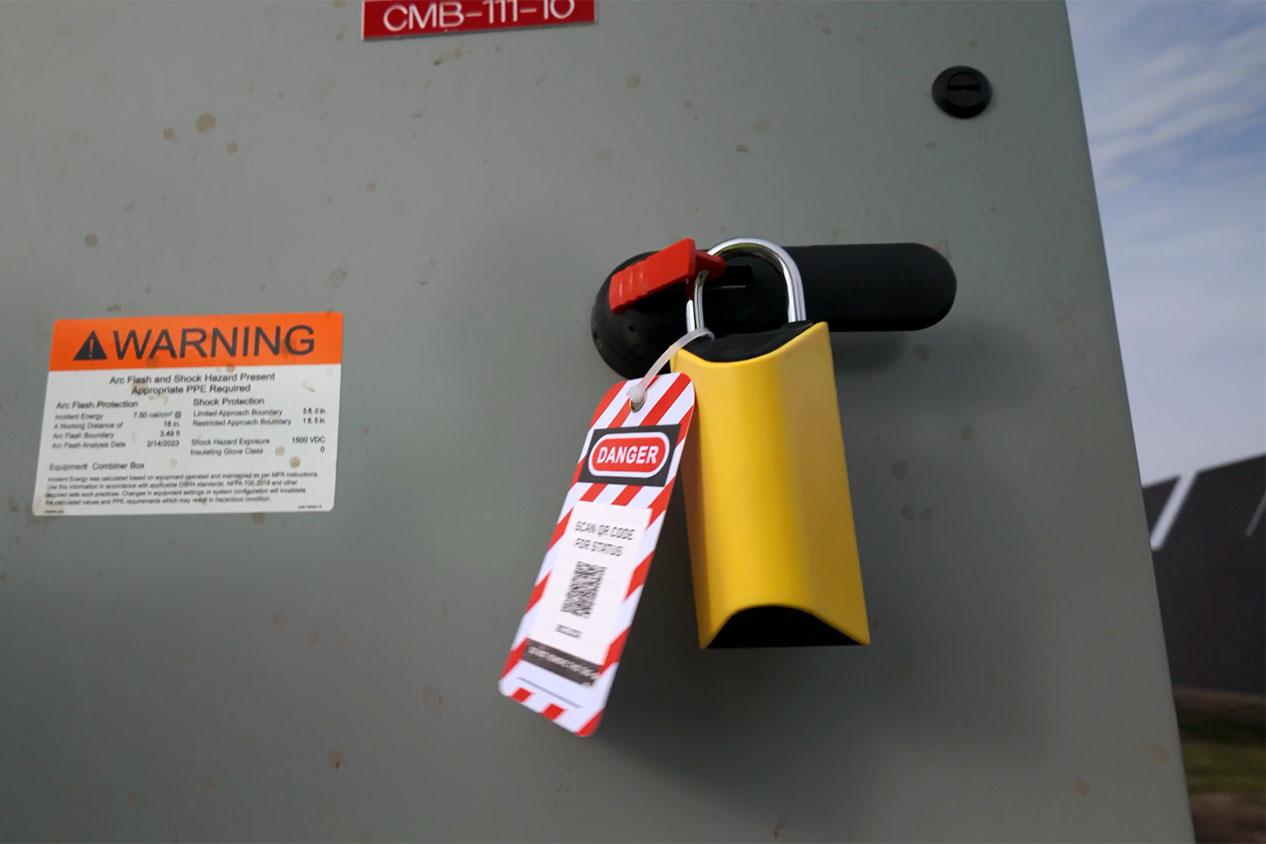 BoxLock LOTO tag on combiner box in utility solar environment